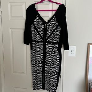 Plus size body con dress with front zipper.